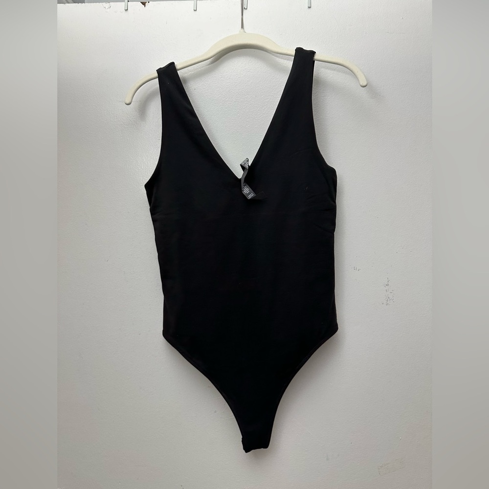 Women’s black Vuori bodysuit
